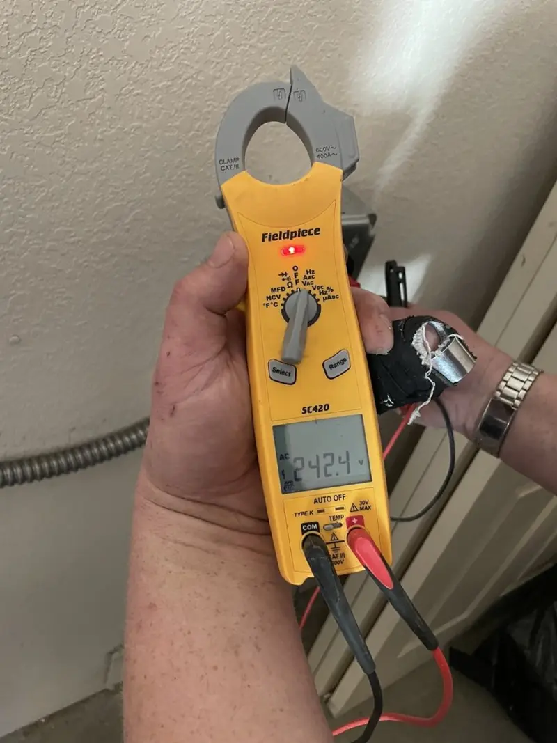 Voltage testing with clamp meter during Generator Installation in Orion